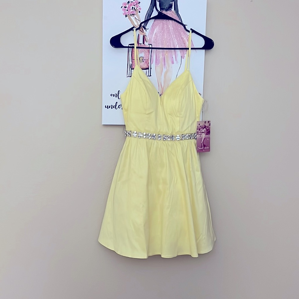 Beautiful brand new dress for spring with a little touch of bling